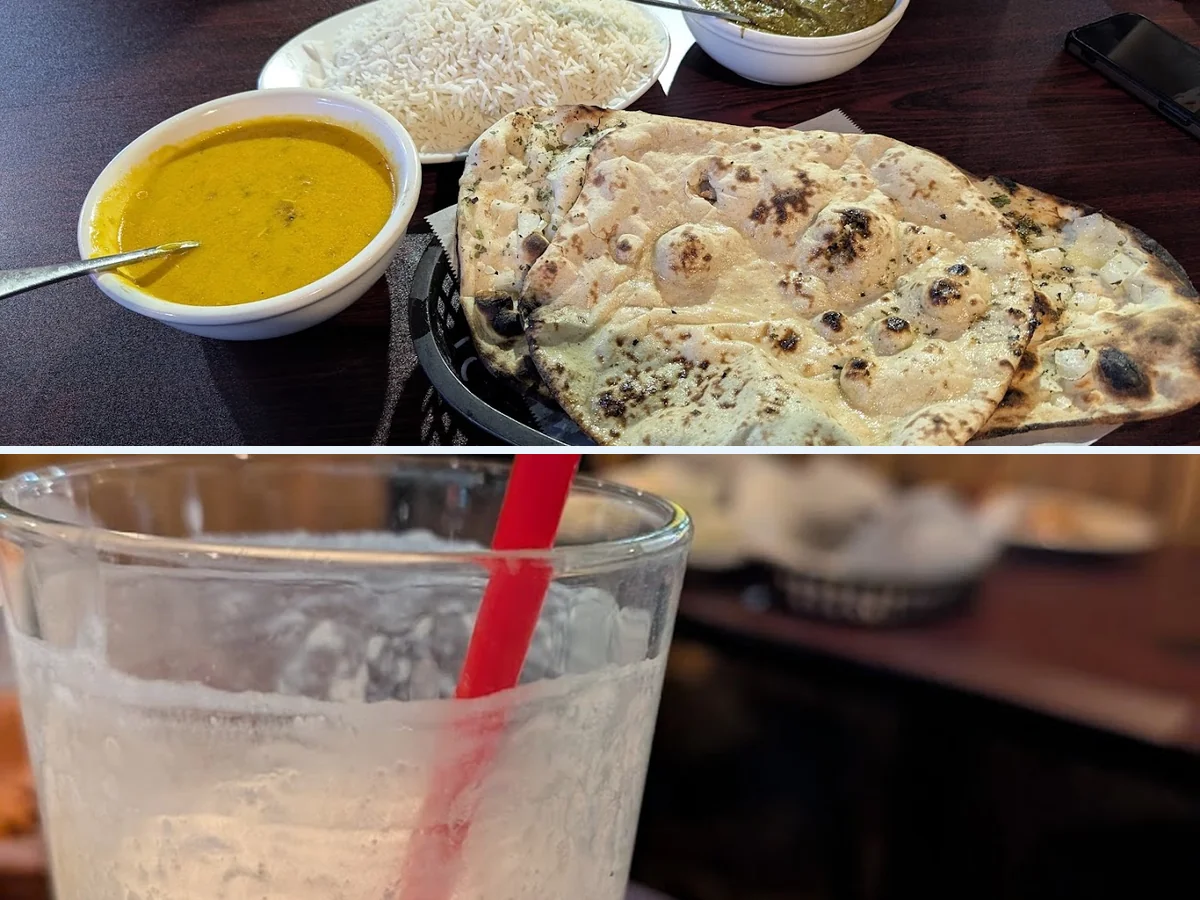 Dining tables inside an Indian restaurant.